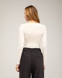Fine knit top with boat neck and long sleeves