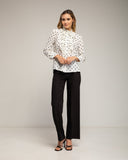 Blusa de lunares con volantes en el pecho. (BLANCA) - Tantra Spain