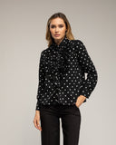 Blusa de lunares con volantes en el pecho. (NEGRA) - Tantra Spain