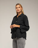 Blusa ovesize con bordados en las mangas y en la parte inferior, mangas acampanadas. - Tantra Spain