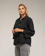 Blusa ovesize con bordados en las mangas y en la parte inferior, mangas acampanadas. - Tantra Spain