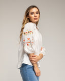 Camisa de manga farol con flores bordadas y detalle de vainica - Tantra Spain