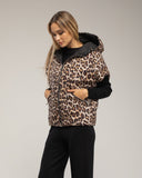 Chaleco acolchado oversize reversible con capucha y bolsillos de cremallera. - Tantra Spain