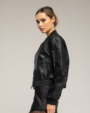 Chaqueta de polipiel tipo bomber con bolsilos laterales - Tantra Spain