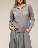 Chaqueta de punto con cremallera y bolsillos, capucha y dibujo de copo de nieve - Tantra Spain
