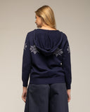 Chaqueta de punto con cremallera y bolsillos, capucha y dibujo de copo de nieve - Tantra Spain