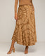 Falda midi con seda, estampado geométrico, vuelo, bolsillos y cintura elástica. - Tantra Spain