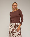 Falda midi de vuelo con seda, estampado de vaca, bolsillos y cintura elástica. - Tantra Spain