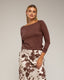 Falda midi de vuelo con seda, estampado de vaca, bolsillos y cintura elástica. - Tantra Spain