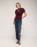 Jeans de tiro alto con bordados de flores en los laterales y en el bolsillo trasero - Tantra Spain