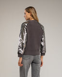 Jersey de punto con mangas de lentejuelas. - Tantra Spain