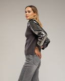Jersey de punto con mangas de lentejuelas. - Tantra Spain