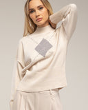 Jersey de punto con rombo y detalles de strass y cuello perkins - Tantra Spain