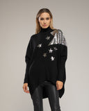 Jersey de punto fino amplio e irregular abajo, con estrellas de strass y cuello perkins - Tantra Spain