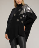 Jersey de punto fino amplio e irregular abajo, con estrellas de strass y cuello perkins - Tantra Spain