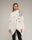 Jersey de punto fino amplio e irregular abajo, con estrellas de strass y cuello perkins - Tantra Spain