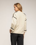 Jersey de punto fino con detalle de pespunte en negro en los laterales mangas y bajo - Tantra Spain