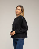 Jersey de punto oversize con detalle de pespunte en el bajo y en los hombros. (NEGRO) - Tantra Spain