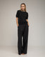 Pantalon de vestir corte recto con pinzas, amplio, y bolsiilos. - Tantra Spain