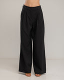 Pantalon de vestir corte recto con pinzas, amplio, y bolsiilos. - Tantra Spain