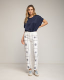 Pantalon denim corte recto con geométrico, caracoles y palmeras - Tantra Spain