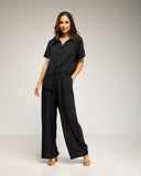 Set de camisa de manga corta y pantalon elástico con bolsillos (Negro) - Tantra Spain