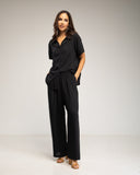 Set de camisa de manga corta y pantalon elástico con bolsillos (Negro) - Tantra Spain