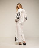 Set de pantalon y top con bordados en las mangas, cuello y en el bajo del pantalon - Tantra Spain