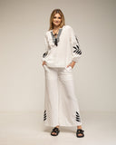 Set de pantalon y top con bordados en las mangas, cuello y en el bajo del pantalon - Tantra Spain