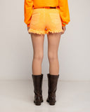 Short denim en color fluor y desflecado en el bajo. - Tantra Spain
