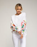 Sudadera con bordados en las mangas. - Tantra Spain