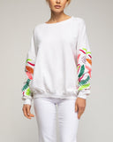 Sudadera con bordados en las mangas. - Tantra Spain