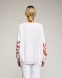 Sudadera con bordados en las mangas. - Tantra Spain