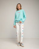 Sudadera con texto iconic en fluor en la parte delantera y trasera (TURQUESA) - Tantra Spain