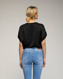Top de raso oversize con bajo y cuello de punto. - Tantra Spain