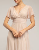 Vestido de tul largo con un pequeña manga, pligue y falda de vuelo , con tira para atar. - Tantra Spain