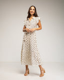 Vestido midi de lunares con botones en la parte de arriba, falda de vuelo y cinturón (BLANCO) - Tantra Spain