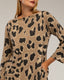 Vestido oversize de estampado animal print, manga larga y bolsillos. - Tantra Spain